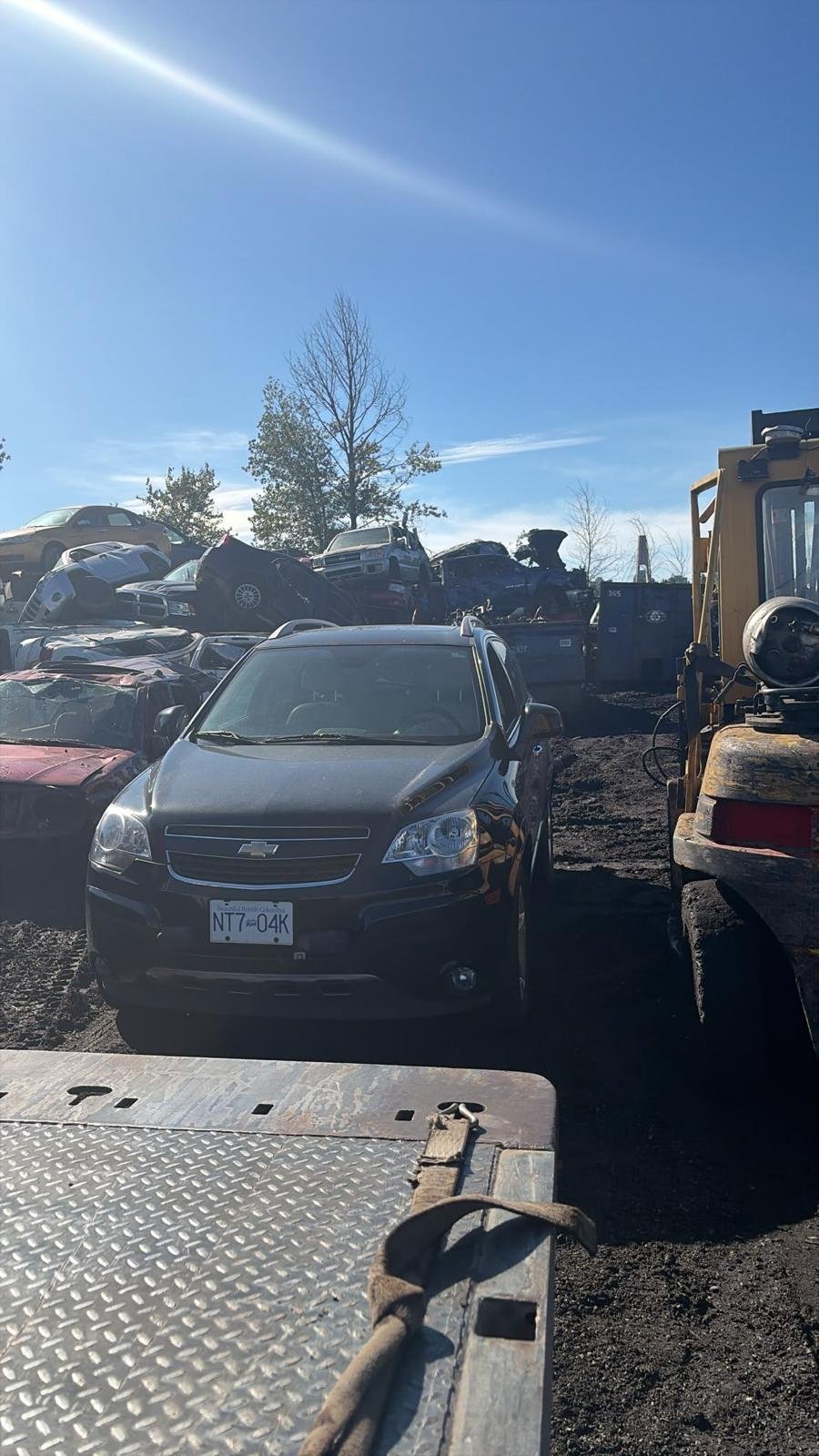 Cash For Cars Surrey crew loading a vehicle in the Cloverdale area of Surrey BC