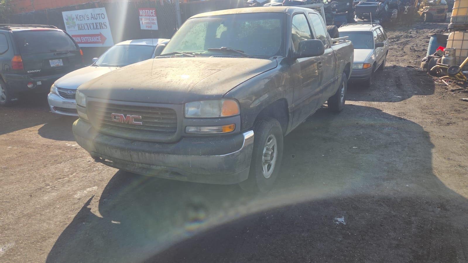 Scrap car being weighed and assessed for cash value in Surrey BC